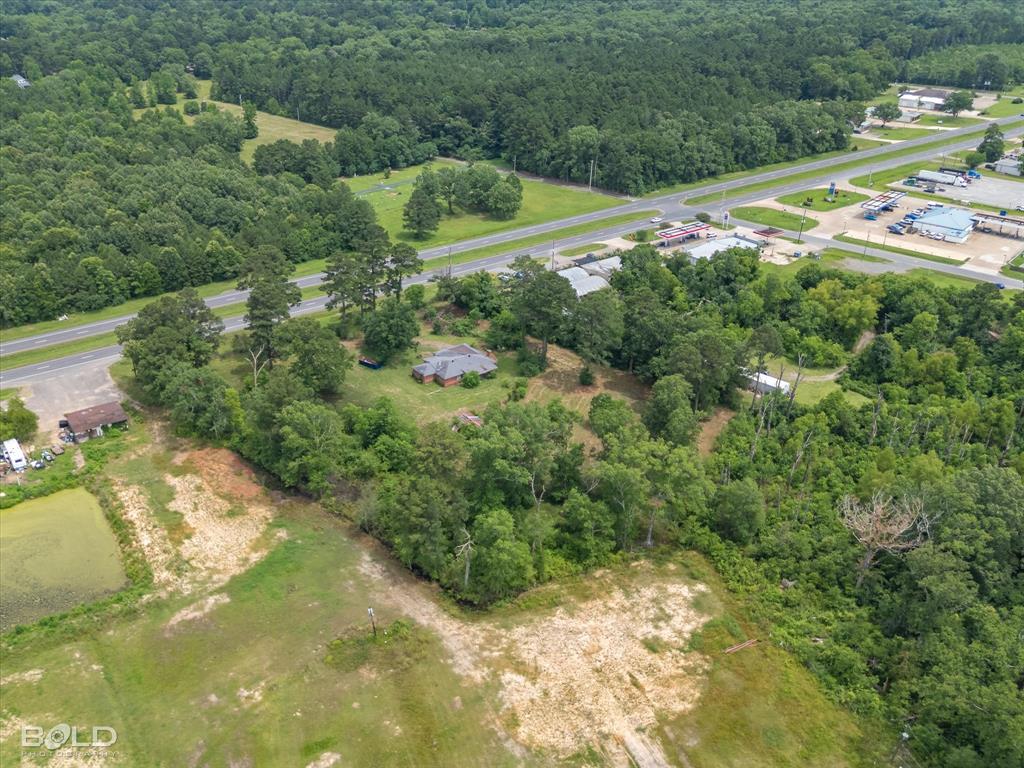 12274 Mansfield Road Keithville, LA 71047 - Photo 8 of 11 a view of a town with mountains in the background
