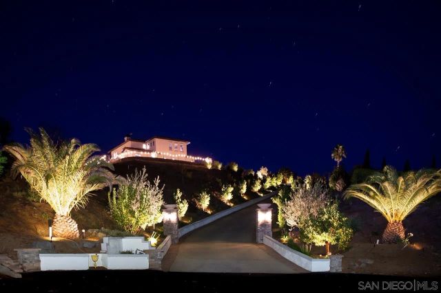 a kitchen with kitchen island granite countertop a sink and counter space
