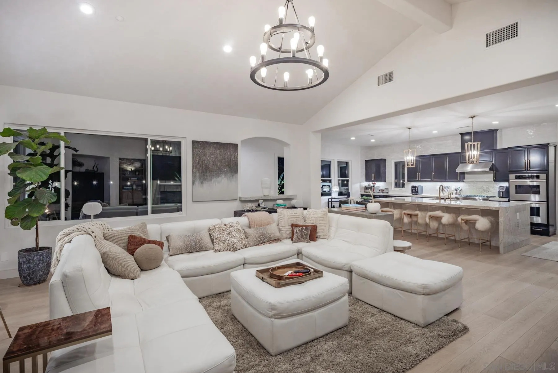 1210 Clos Duval Bonsall, CA 92003 - Photo 7 of 32 a living room with furniture kitchen and a chandelier