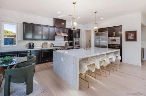 a view of balcony with furniture