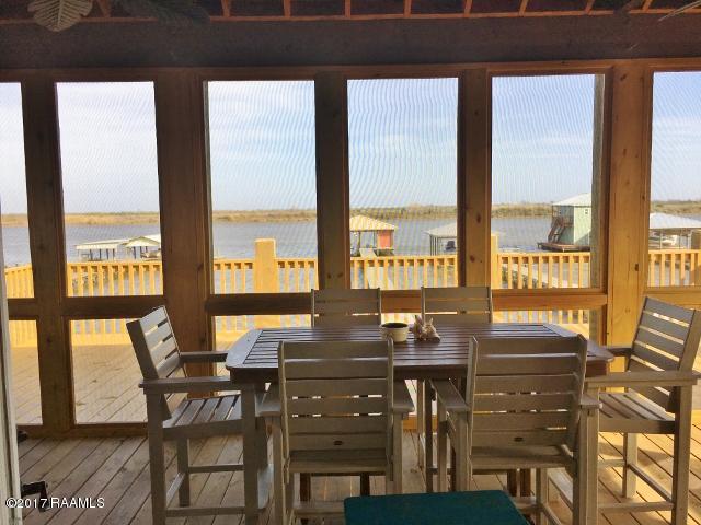 551 Lake Breeze Road Hackberry, LA 70645 - Photo 7 of 36 View from Screened Porch