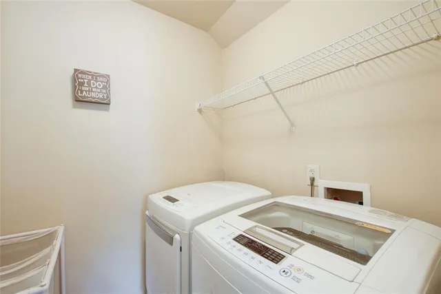 a view of a house with brick walls