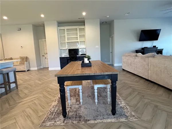 a view of a workspace with furniture