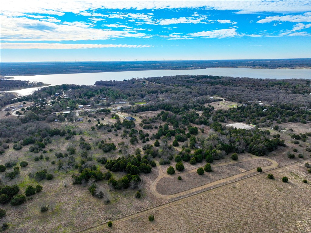 16664 County Road 3120 Road Northwest Purdon, TX 76679 - Photo 50 of 59 a view of a lake with a mountain