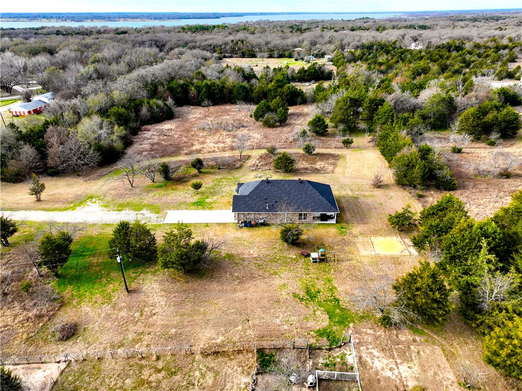 16664 County Road 3120 Road Northwest Purdon, TX 76679 - Photo 54 of 59 an aerial view of residential houses with outdoor space