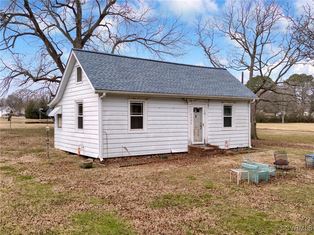 5303 Eanes Lane Henrico, VA 23231 - Photo 2 of 5 View of front of property featuring a fire pit and