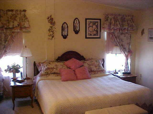 17731 G Road Cortez, CO 81321 - Photo 6 of 9 a bedroom with a bed and a table