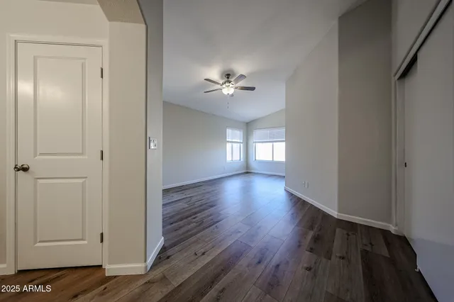 a bathroom with a double vanity sink mirror and shower