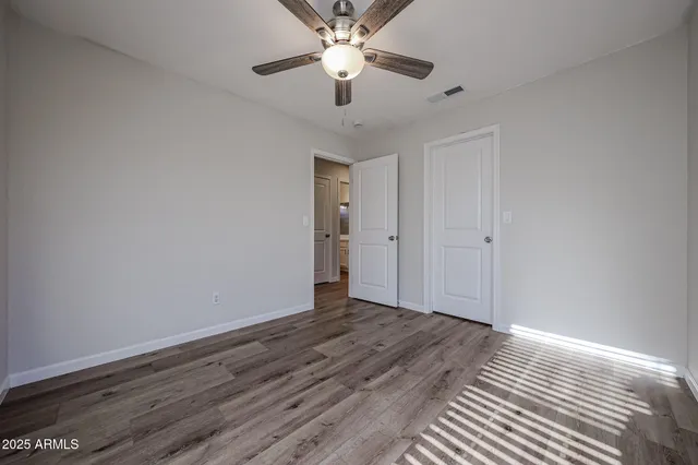 a view of a room with racks on the wall