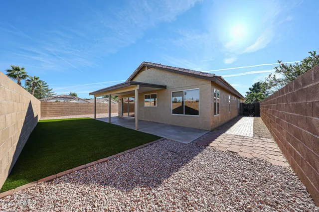 a view of wooden floor with a white door