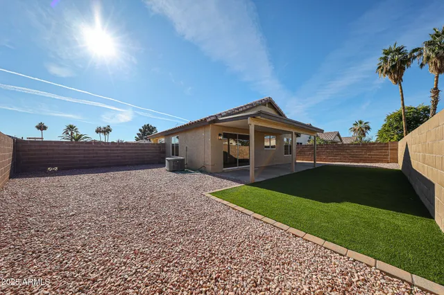 a house view with a backyard space