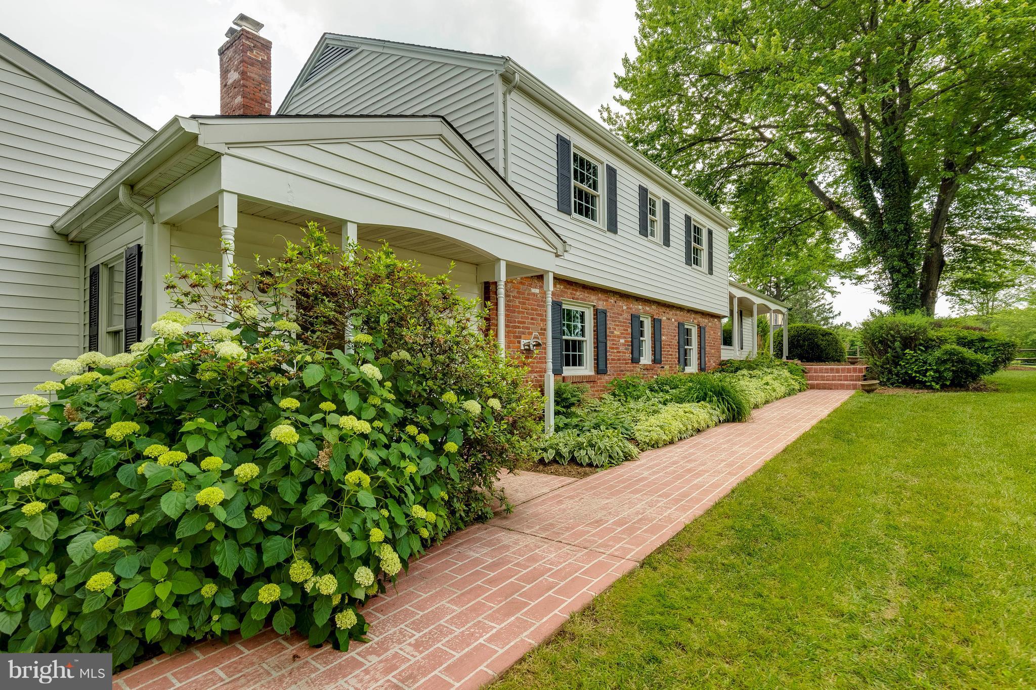 2708 Calkins Road Herndon, VA 20171 - Photo 2 of 30 Brick Walkway and beautiful landscaping