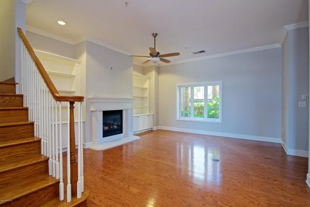 a room with window and wooden floor