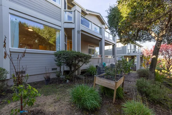 a backyard of a house with lots of green space