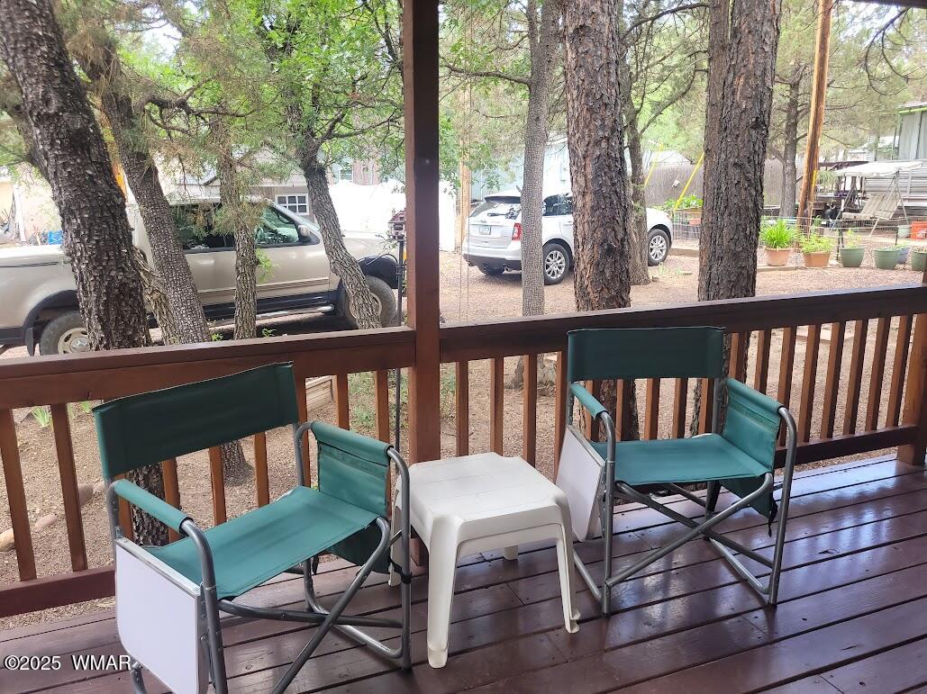 1930 Larson Road, Unit 8 Lakeside, AZ 85929 - Photo 16 of 26 20250609_120901 Deck & Trees