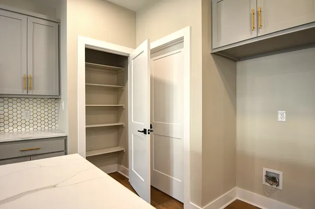 a room with a bed and a window