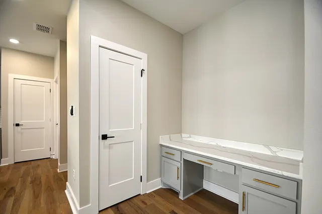 a view of an empty walk in closet