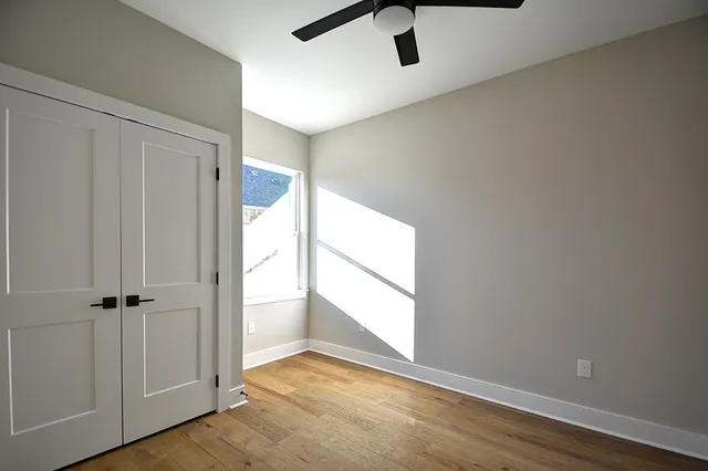 an empty room with a empty space and a window