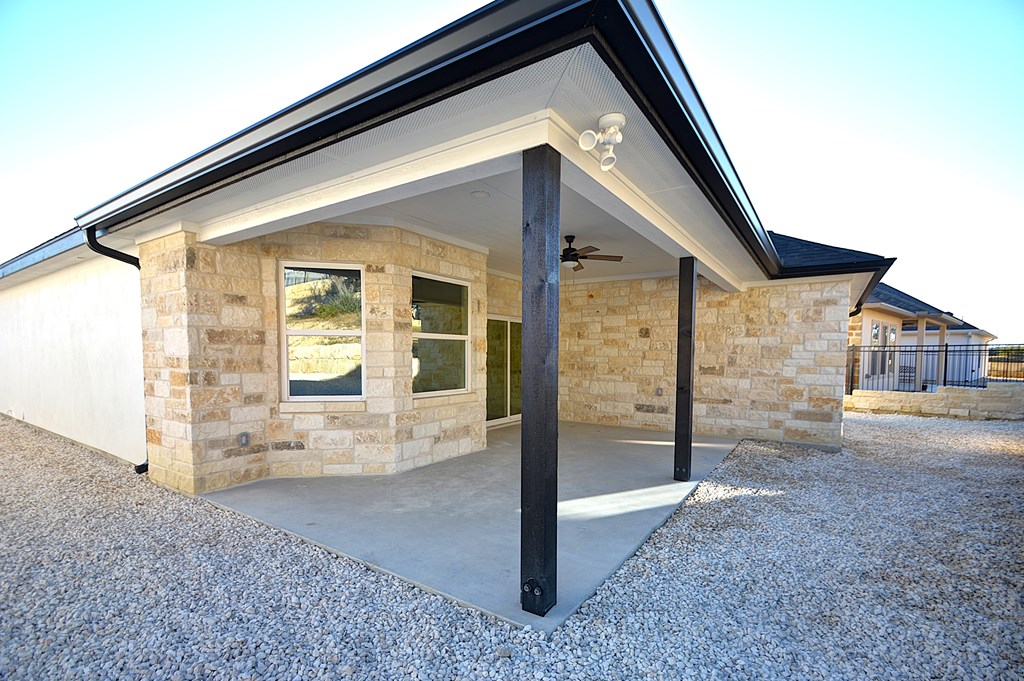 1806 Chateau Kerrville, TX 78028 - Photo 39 of 44 a view of a house with a yard