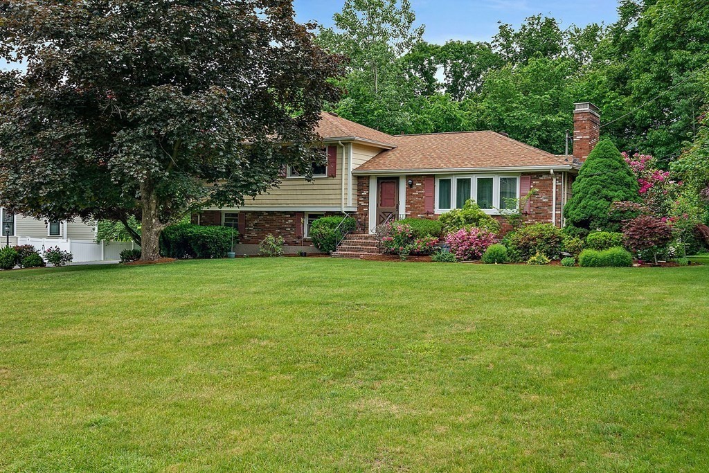 a view of a house with garden
