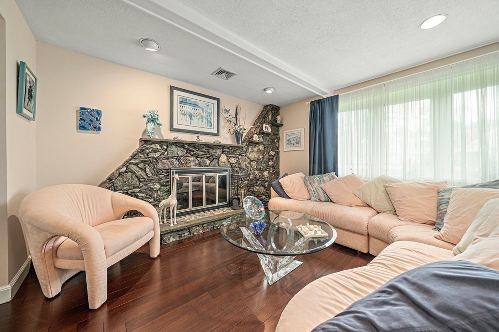 4 Kings Road Canton, MA 02021 - Photo 11 of 33 a living room with furniture and a wooden floor