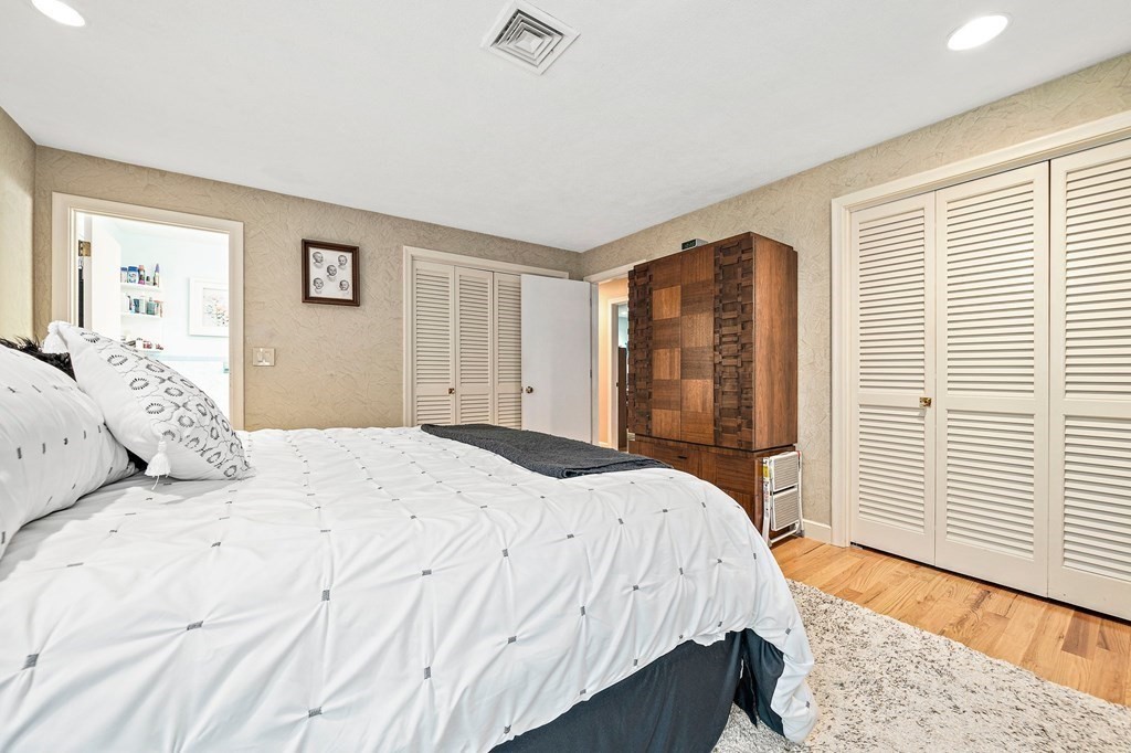 4 Kings Road Canton, MA 02021 - Photo 15 of 33 a bedroom with a large bed and a window