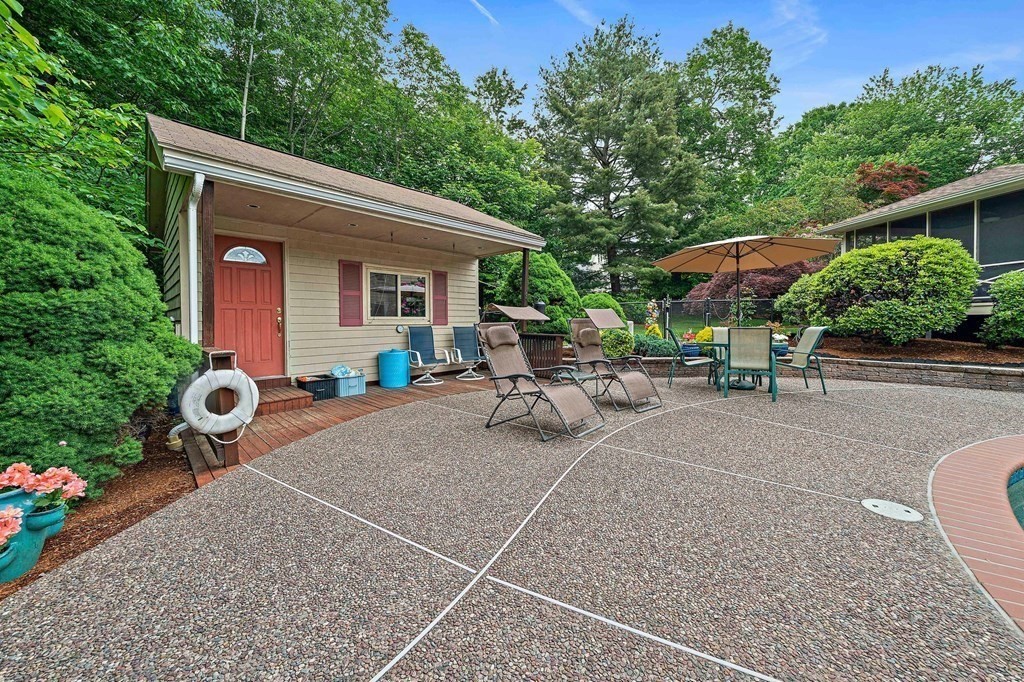 4 Kings Road Canton, MA 02021 - Photo 28 of 33 a view of a backyard with sitting area and furniture