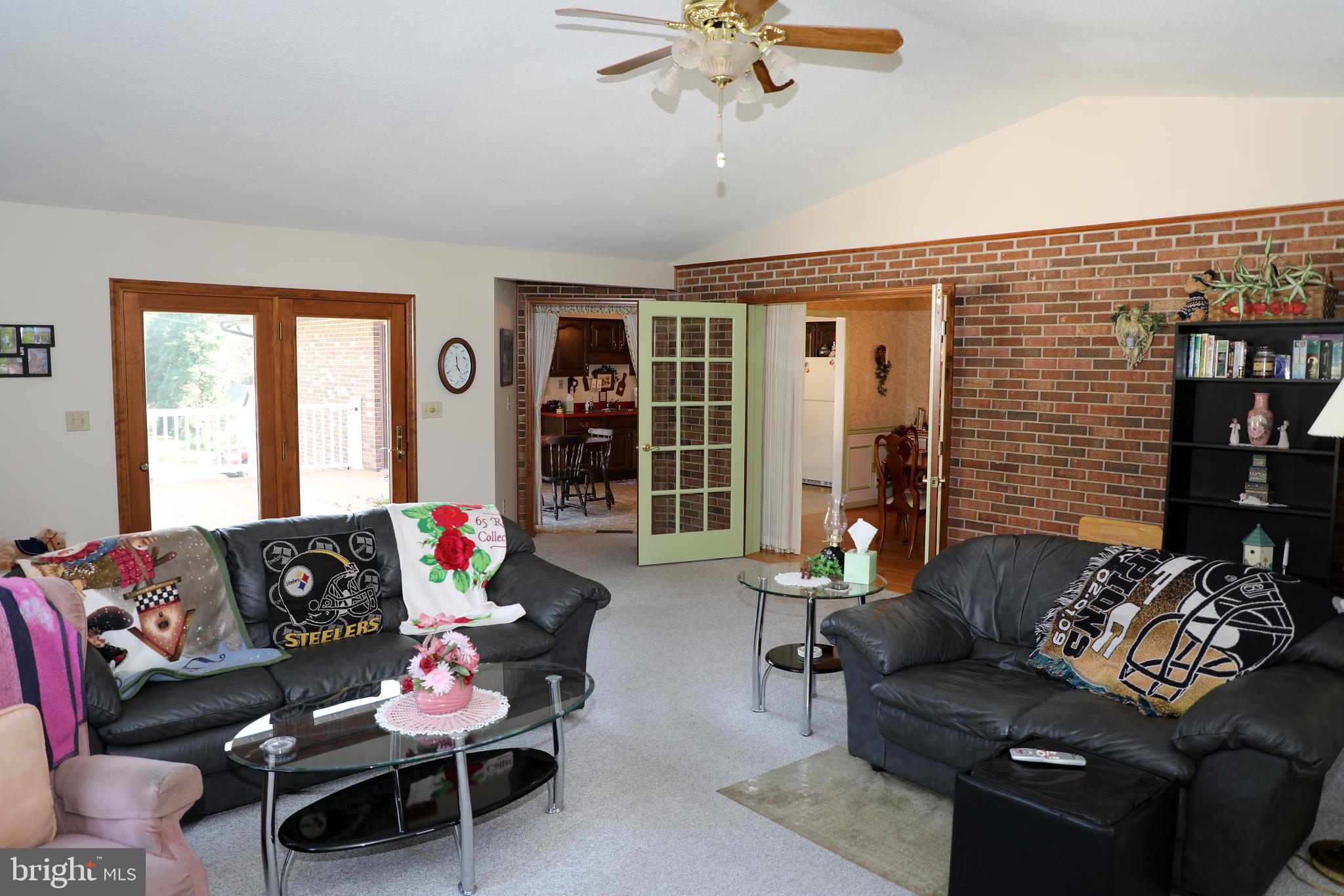 7839 Ridge Road Frederick, MD 21702 - Photo 17 of 63 24 x 20 Family room with entrance to patio.