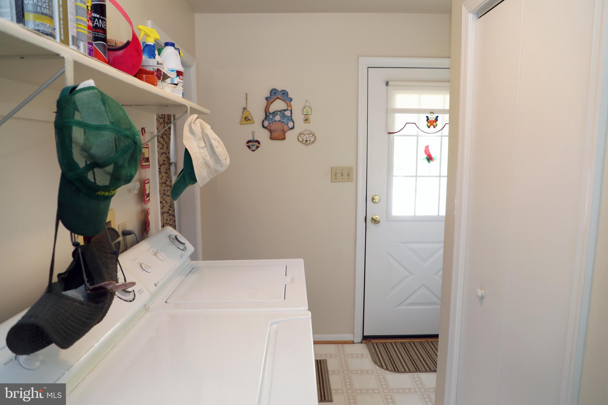 7839 Ridge Road Frederick, MD 21702 - Photo 28 of 63 Mud room with entrance to deck