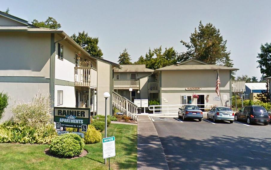 202 Edwards Street Northwest Yelm, WA 98597 - Photo 1 of 6 a car parked in front of a building