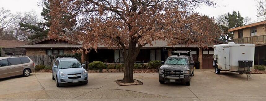 3709 67th Street Lubbock, TX 79413 - Photo 1 of 1 a car parked in front of house