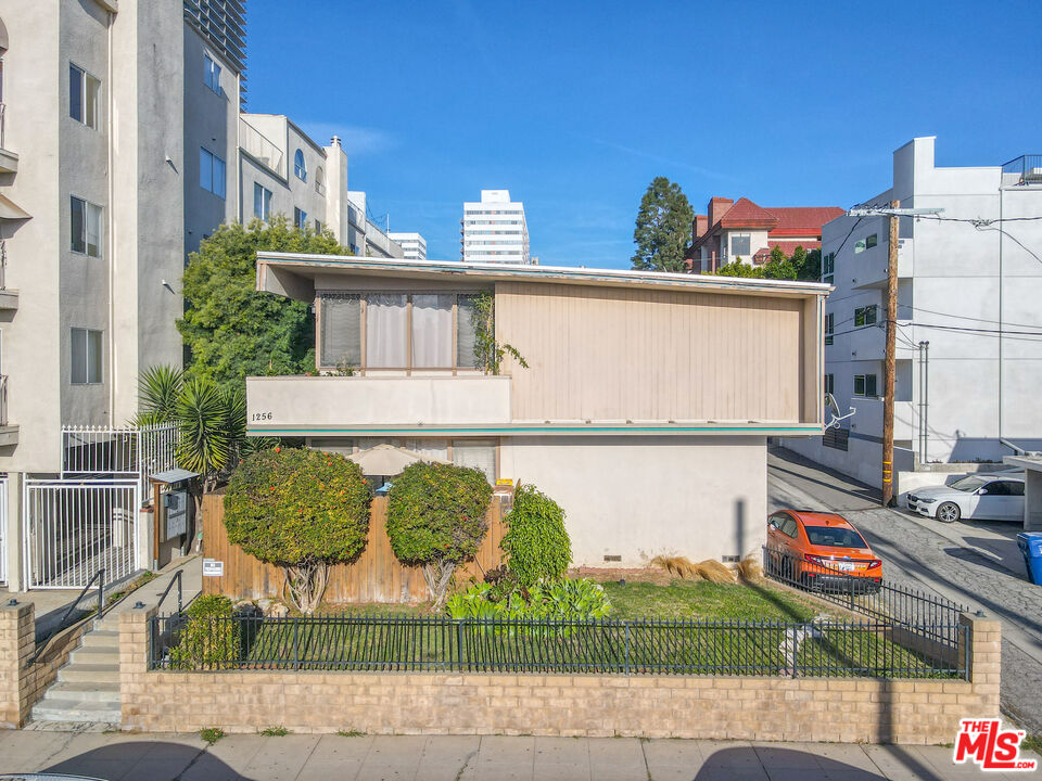 1256 South Westgate Avenue Los Angeles, CA 90025 - Photo 2 of 11 a front view of a house with garden