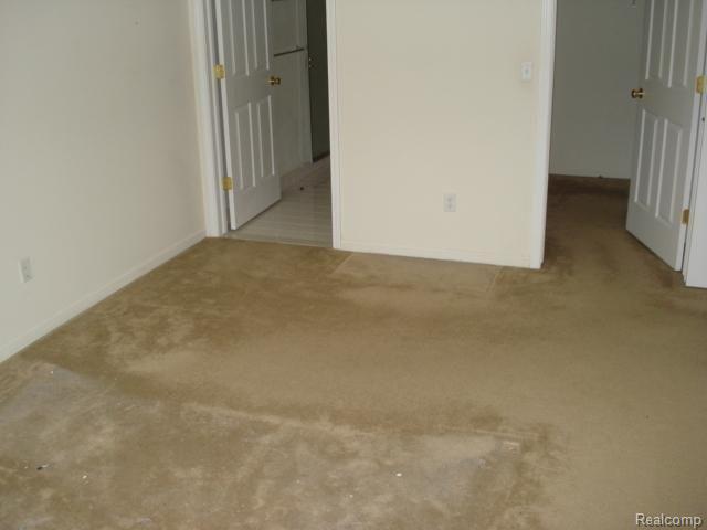 46129 Rhodes Drive, Unit 300 Macomb, MI 48044 - Photo 7 of 7 master-bed.JPG