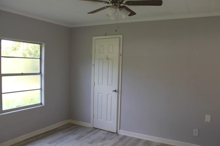 875 Woodrow Street Silsbee, TX 77656 - Photo 26 of 30 an empty room with a window