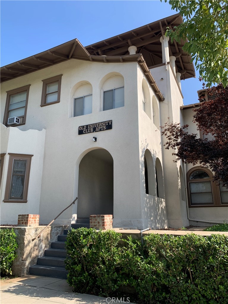 403 Cajon Street, Unit 5 Redlands, CA 92373 - Photo 3 of 16 a front view of a house with a yard