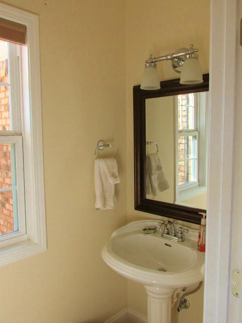 136 Barbara Spears Road Morrison, TN 37357 - Photo 12 of 26 Next to the kitchen is a half bath.