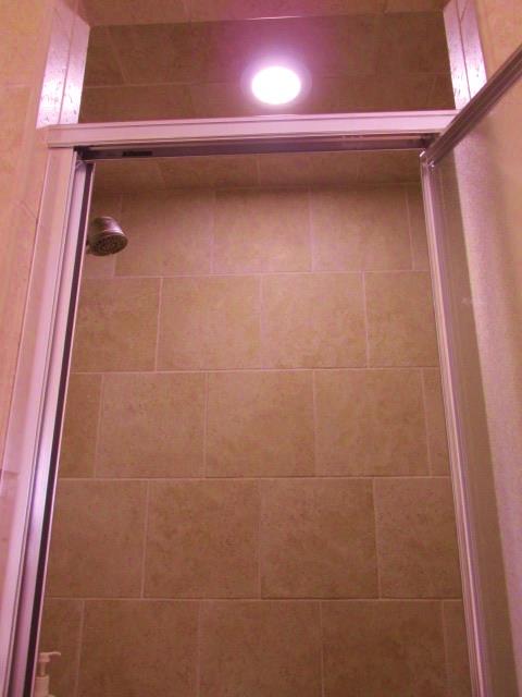 136 Barbara Spears Road Morrison, TN 37357 - Photo 18 of 26 A lighted tile walk-in shower in the master bath.