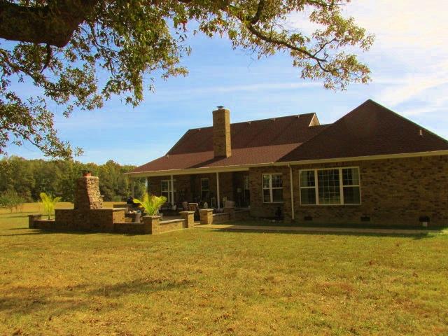 136 Barbara Spears Road Morrison, TN 37357 - Photo 20 of 26 An outside fireplace is always a winner for Tennessee nights.