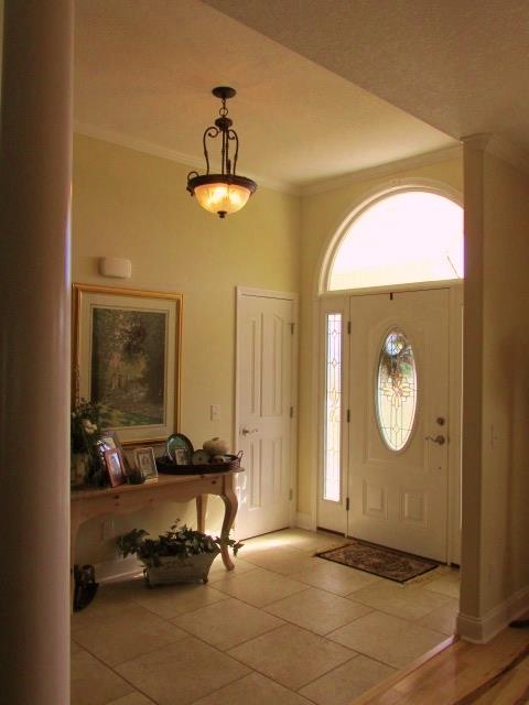 136 Barbara Spears Road Morrison, TN 37357 - Photo 3 of 26 A beautiful foyer with grand pillars greet you at the front door.