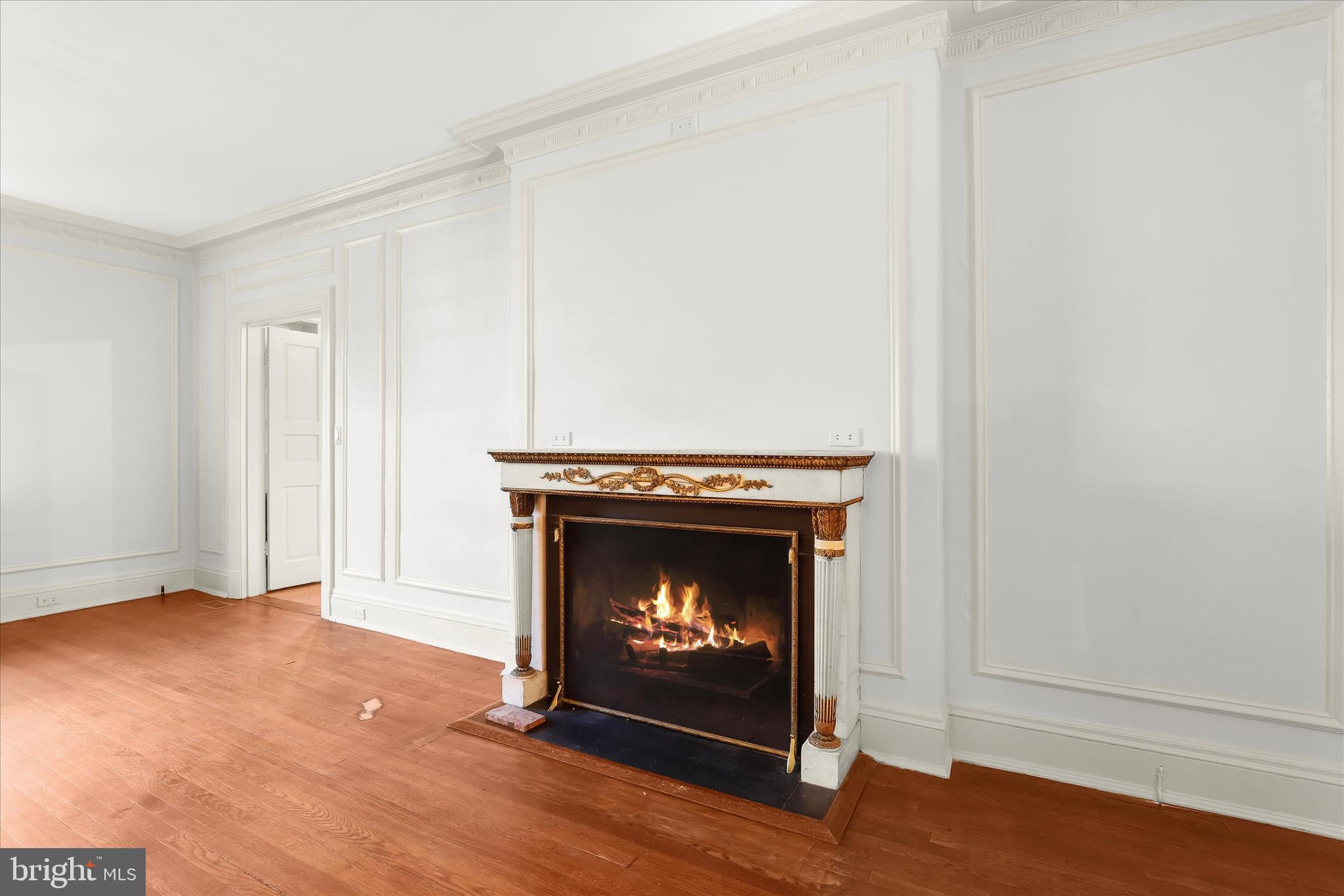 2209 Ken Oak Road Baltimore, MD 21209 - Photo 18 of 102 a living room with a fireplace
