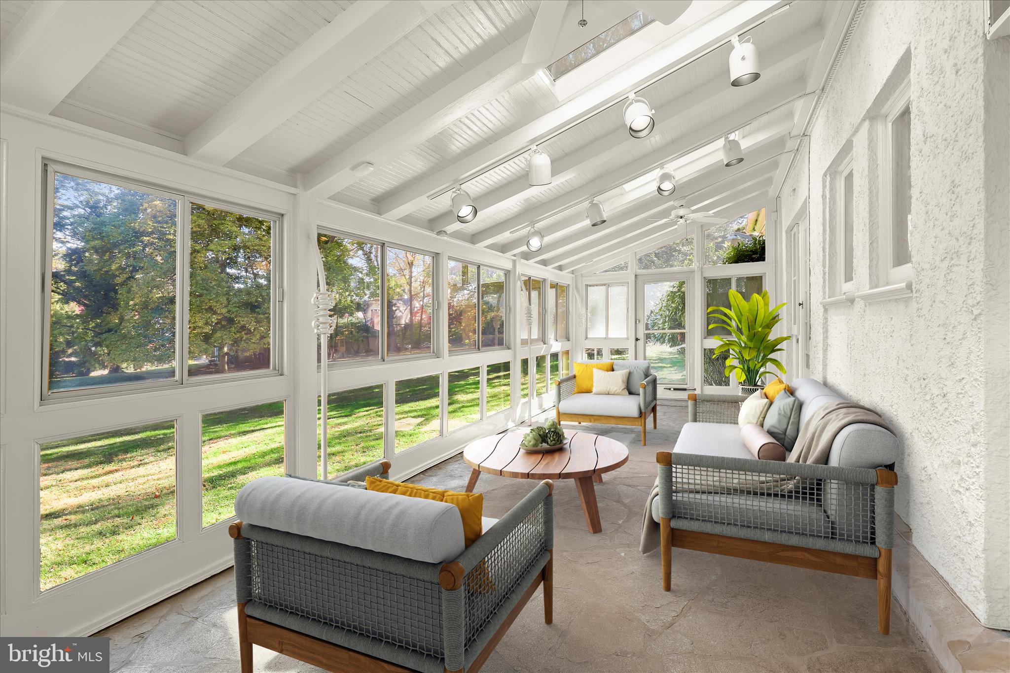 2209 Ken Oak Road Baltimore, MD 21209 - Photo 21 of 102 a living room with furniture and a large window