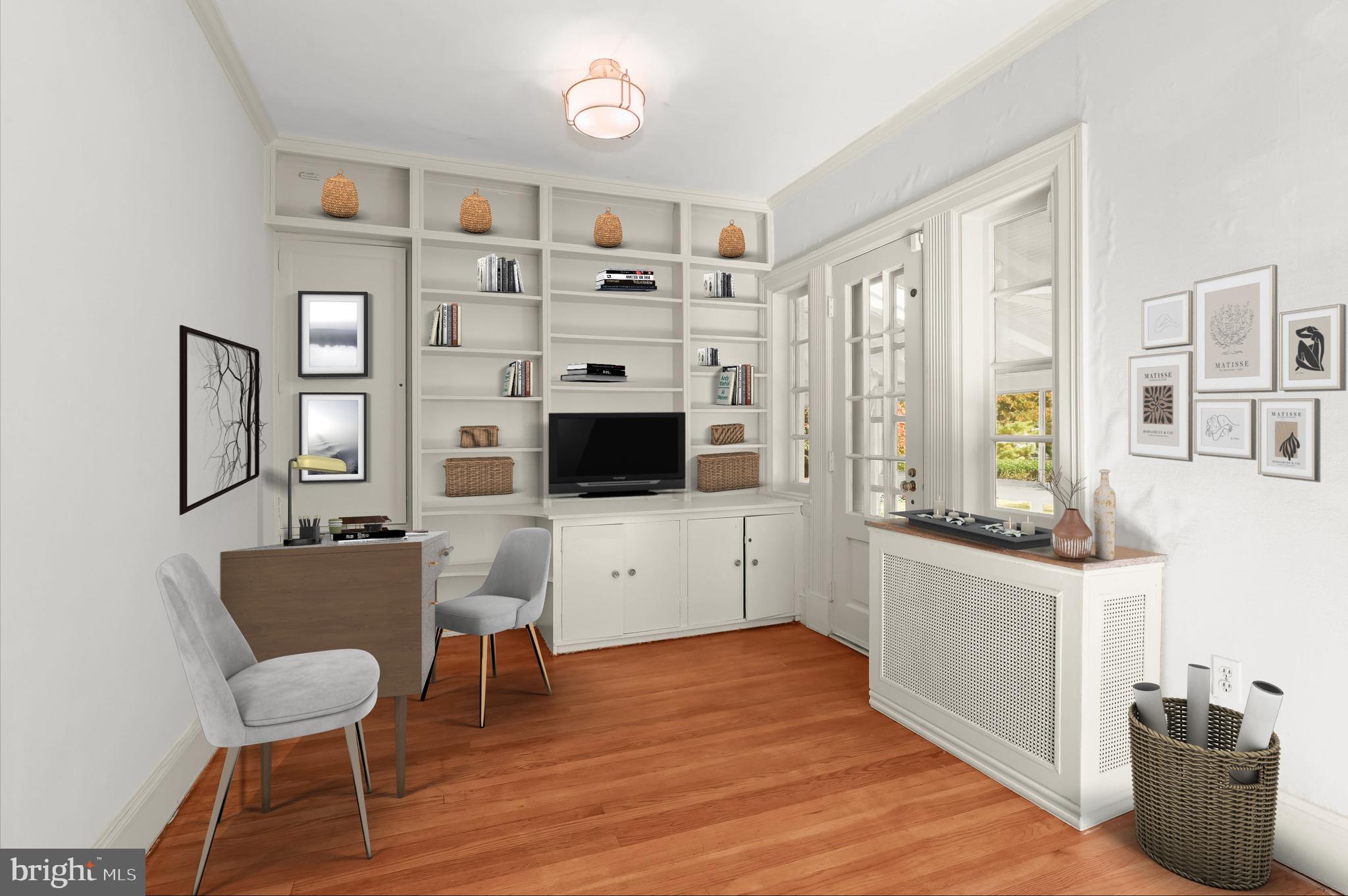 2209 Ken Oak Road Baltimore, MD 21209 - Photo 23 of 102 a living room with furniture and a flat screen tv