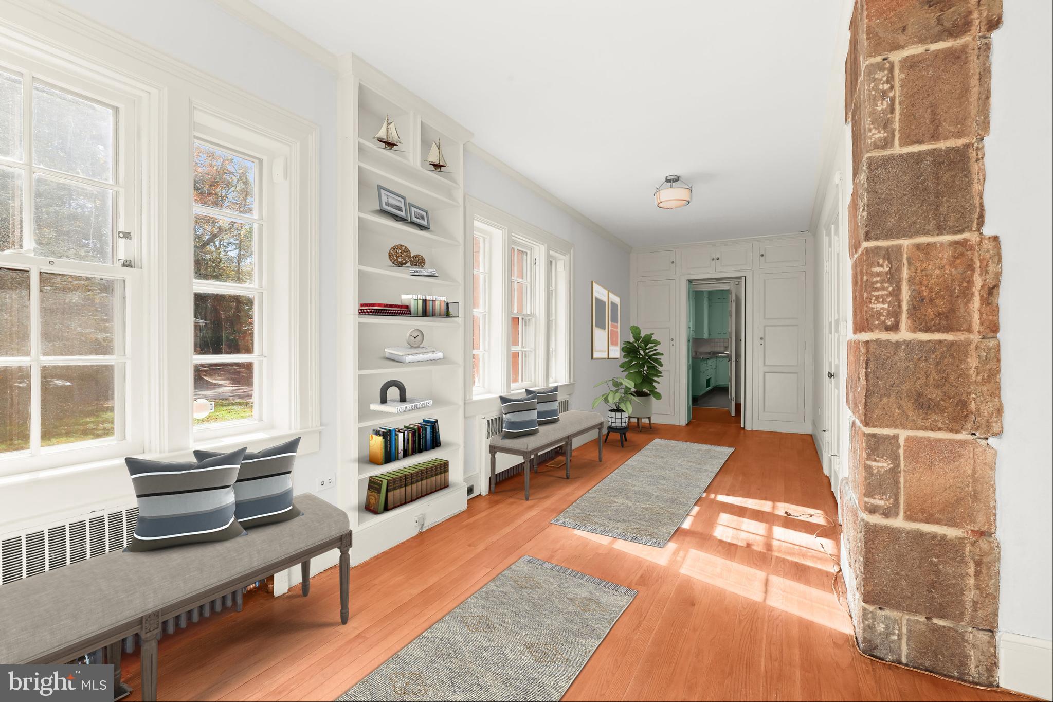 2209 Ken Oak Road Baltimore, MD 21209 - Photo 25 of 102 a living room with furniture lamp and a fireplace