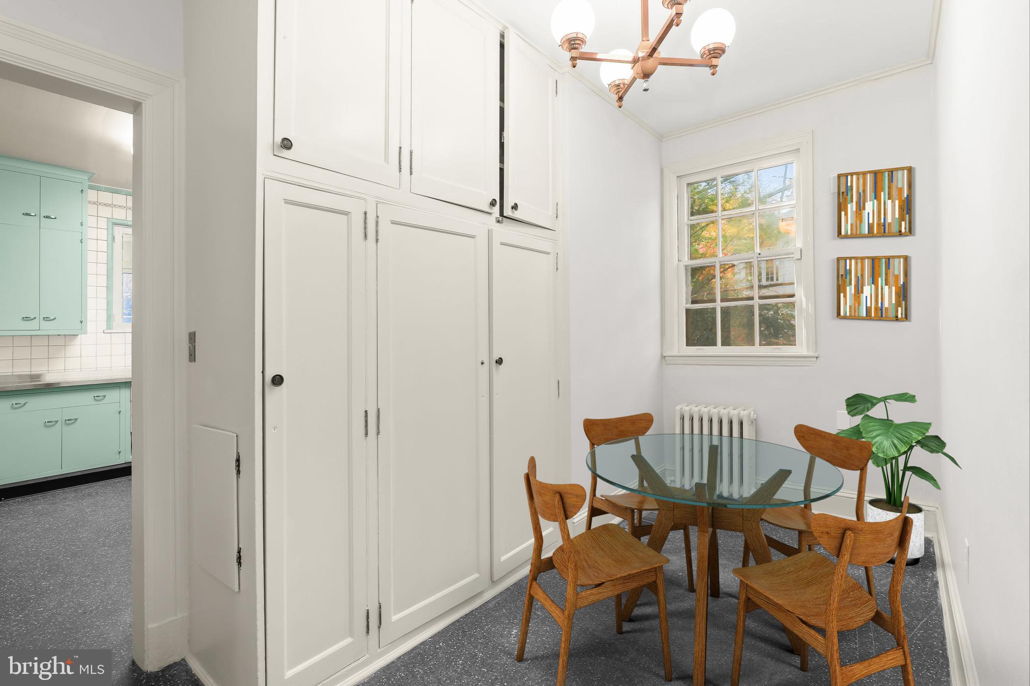 2209 Ken Oak Road Baltimore, MD 21209 - Photo 31 of 102 a view of a dining room with furniture and a window