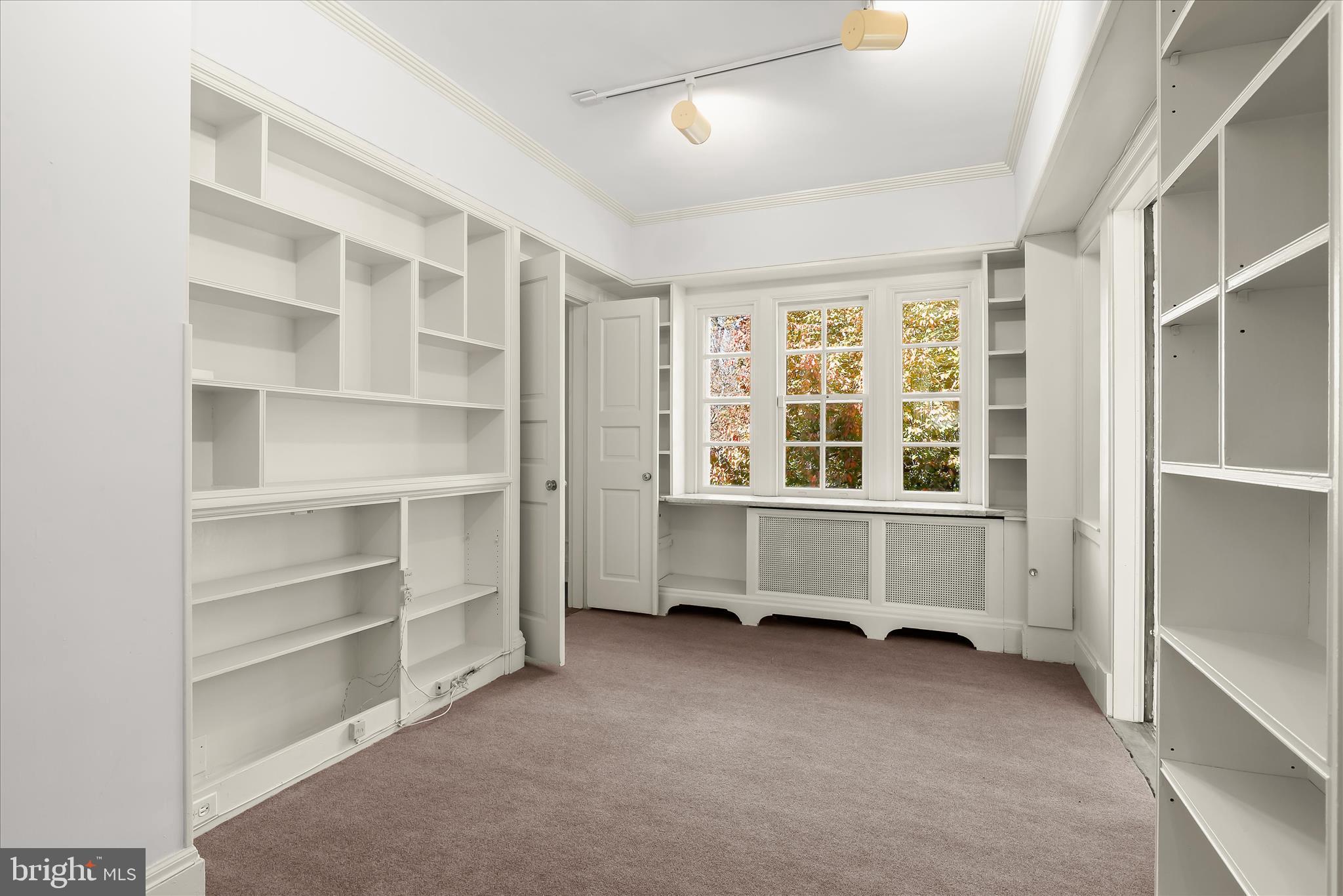 2209 Ken Oak Road Baltimore, MD 21209 - Photo 37 of 102 a view of an empty room with a window