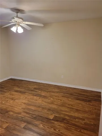 a view of an ocean empty room and wooden floor