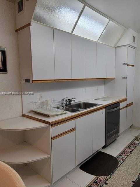 1000 West Island Boulevard, Unit 1511 Aventura, FL 33160 - Photo 12 of 41 a kitchen with stainless steel appliances granite countertop a sink and a stove