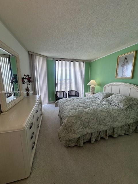 1000 West Island Boulevard, Unit 1511 Aventura, FL 33160 - Photo 15 of 41 a spacious bedroom with a bed and a dresser
