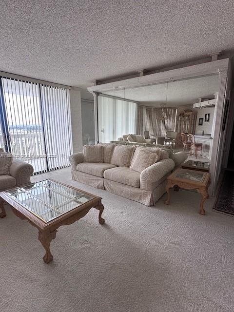 1000 West Island Boulevard, Unit 1511 Aventura, FL 33160 - Photo 3 of 41 a living room with furniture and a window