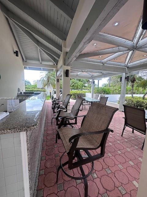 1000 West Island Boulevard, Unit 1511 Aventura, FL 33160 - Photo 34 of 41 a outdoor space with lots of tables and chairs